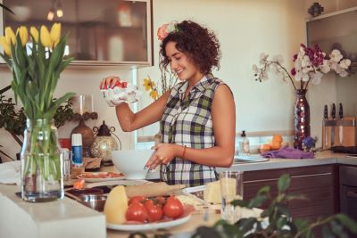 woman in kitchen cooking