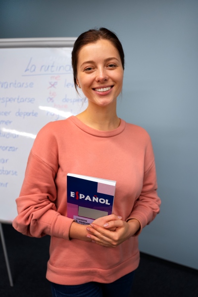 woman on a computer learning Spanish